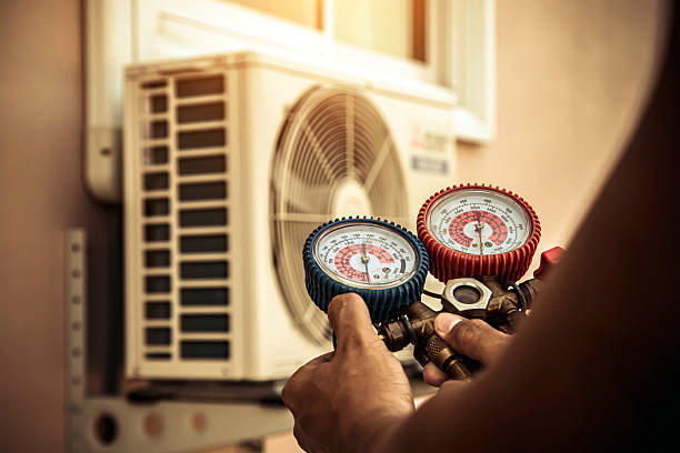 Professional Emergency Hvac technician working in Millville, MA